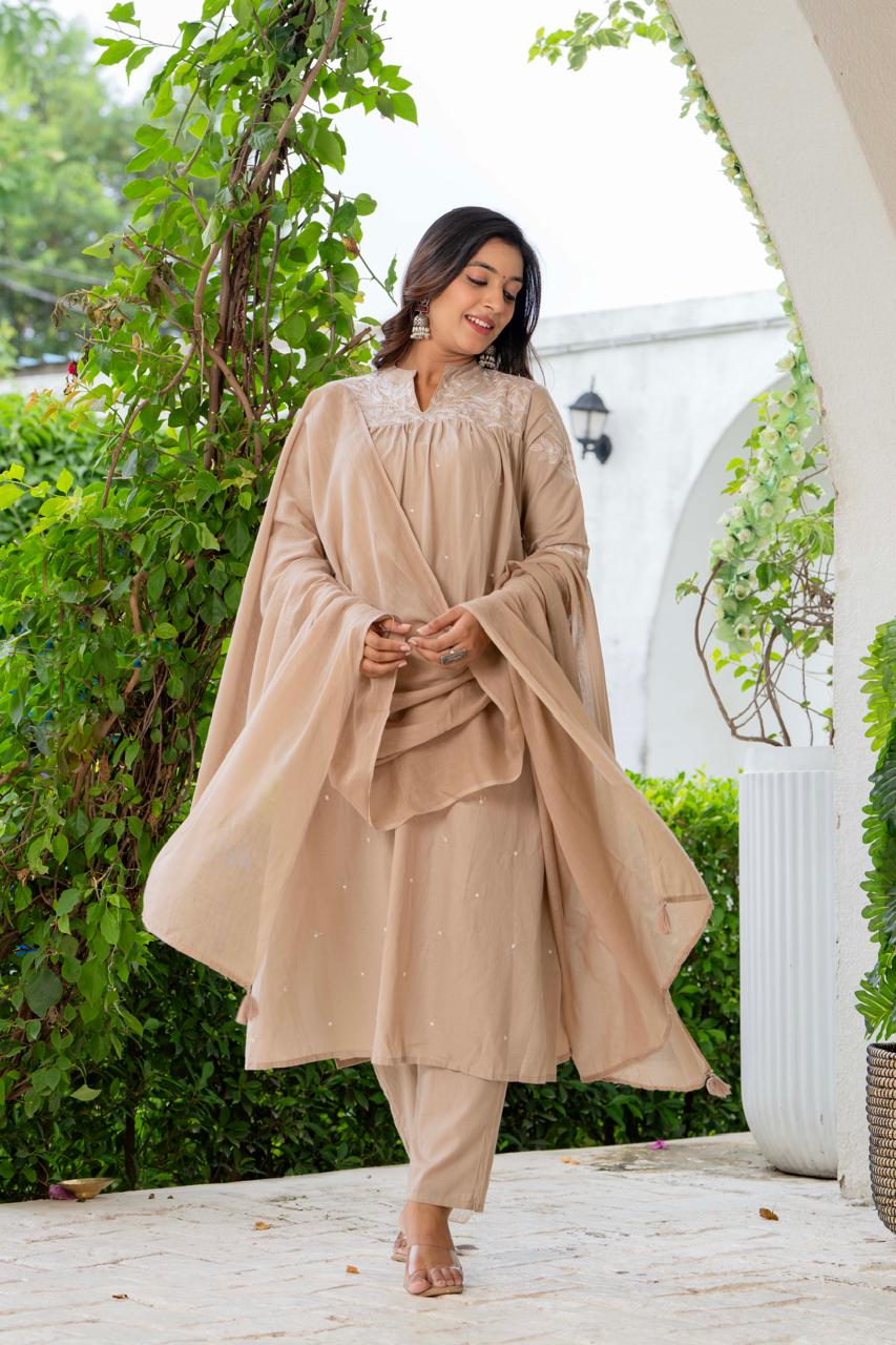 Kurta Nude Silk Blend Solid Embroidered Flared Suit Set